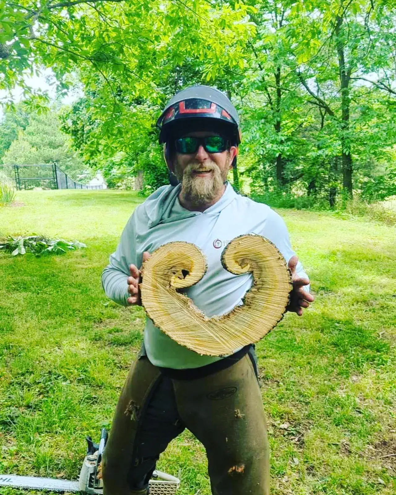 Happy person with heart shape wood